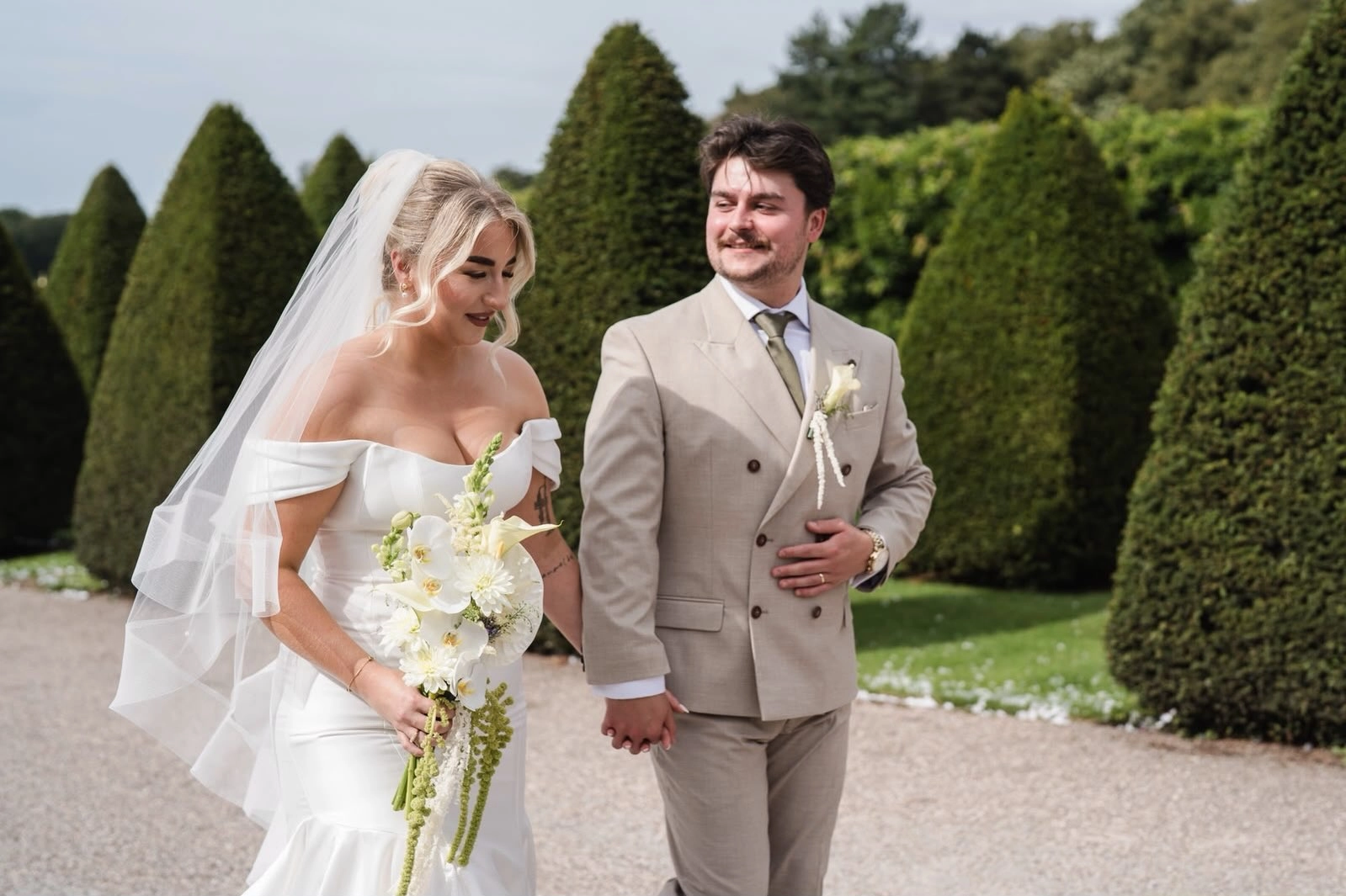 Wedding couple portrait photos in the garden of Knowsley hall